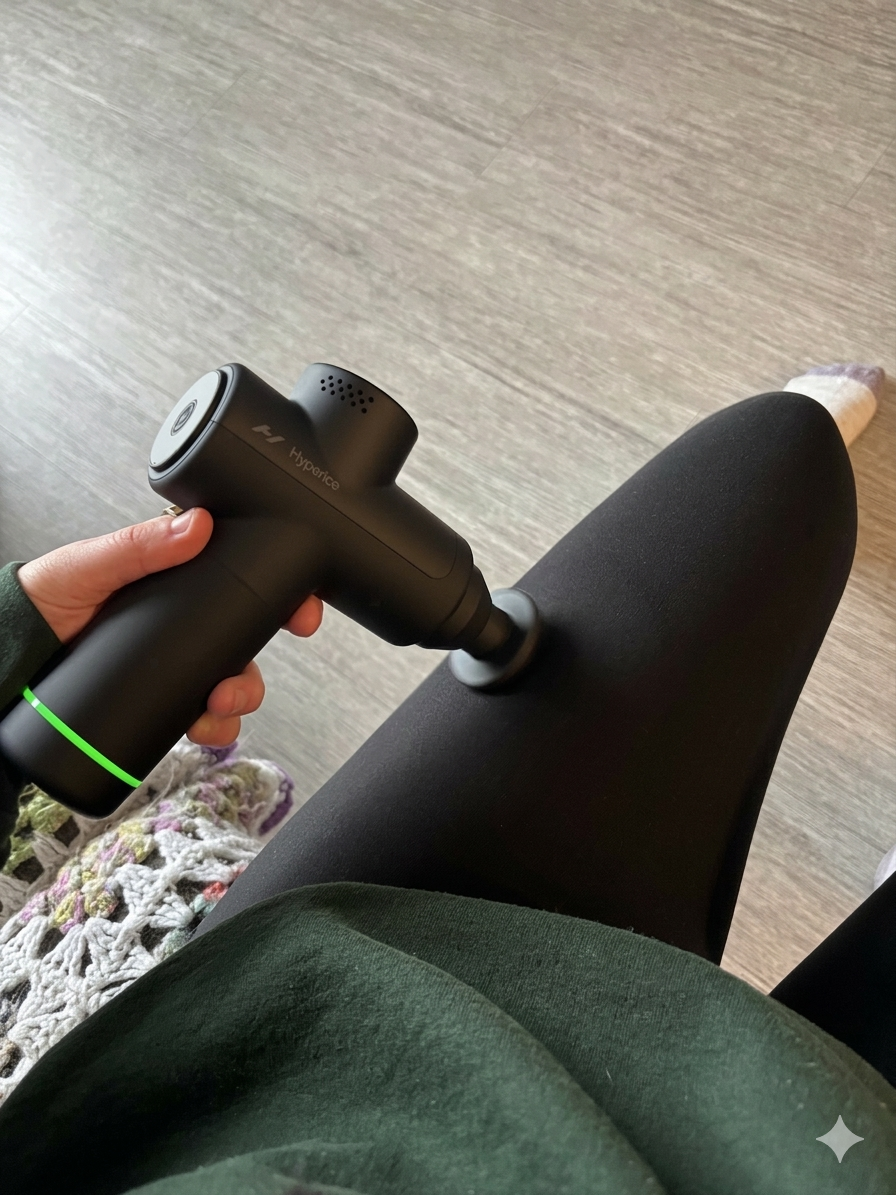 Using the Hypervolt Go 2 massage gun on legs after a run