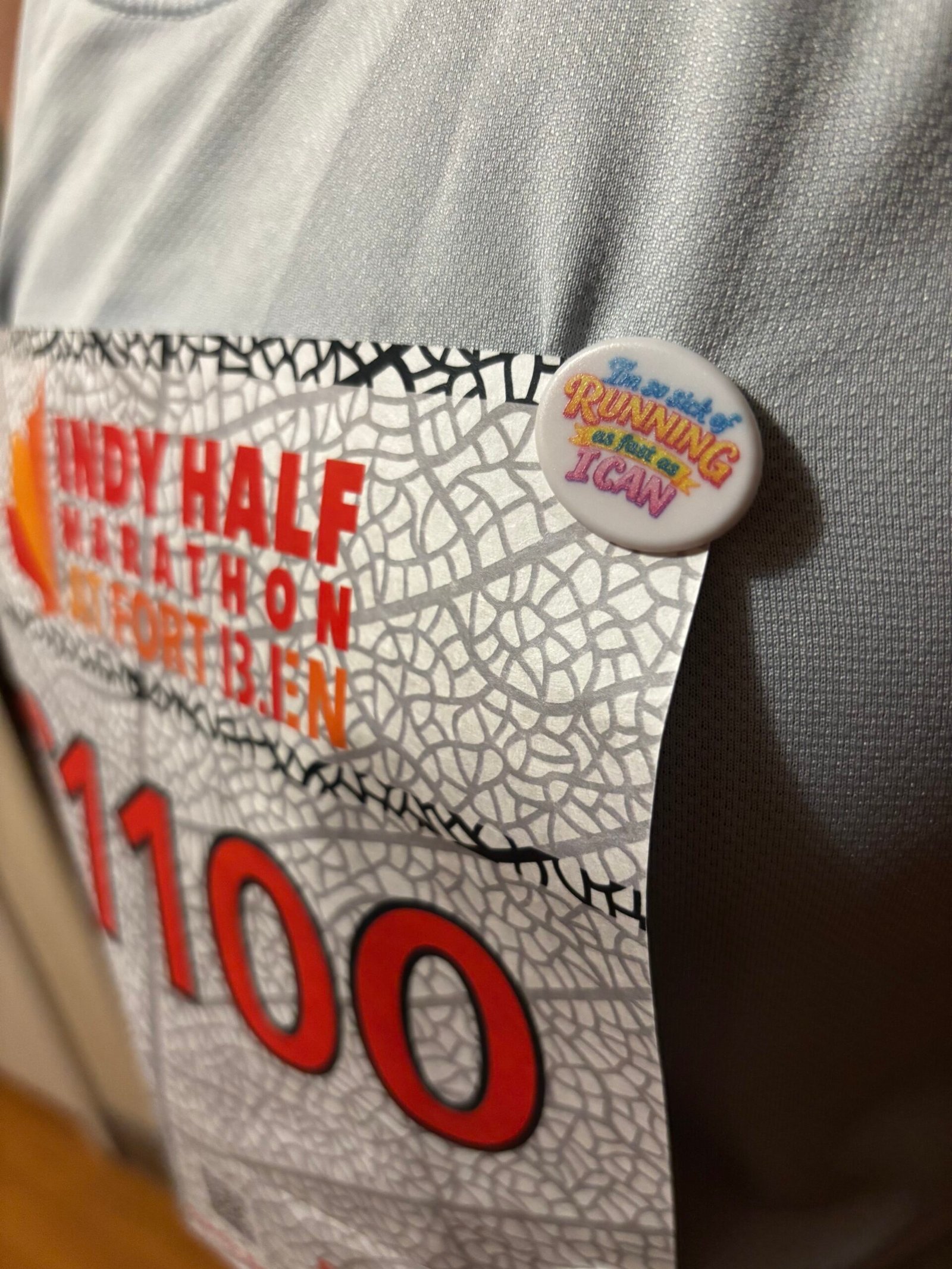 bibSNAPS holding a race bib before the Fort Ben Half Marathon