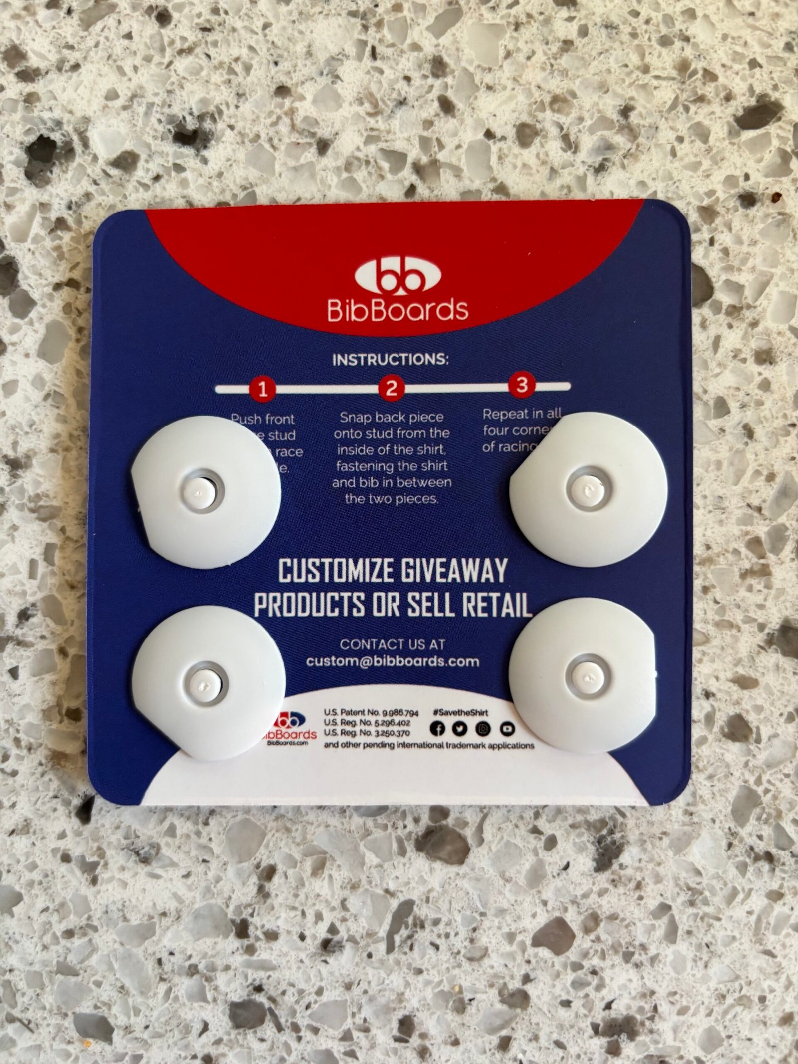 The back of bibSNAPS showing the plastic piece they snap into